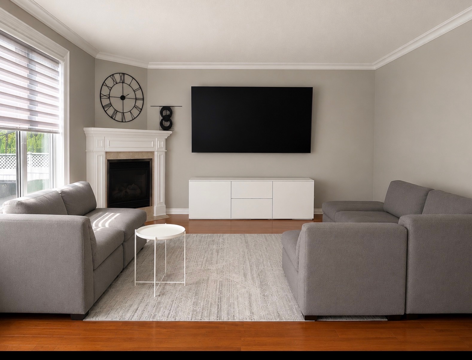 Living room renovation with fireplace and hardwood floors